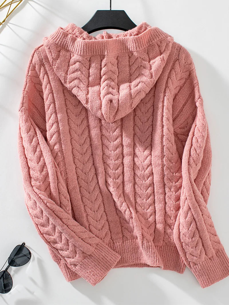 Pull femme rose torsadé à capuche